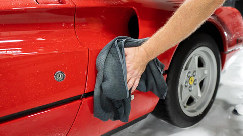 drying car with microfiber towel 