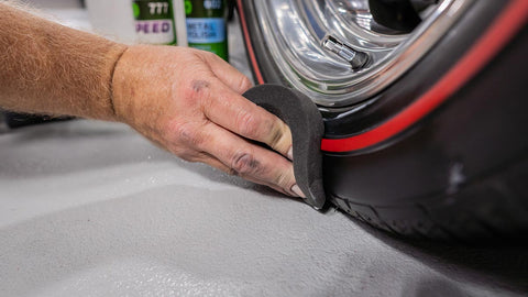 polishing car tire with cleaner