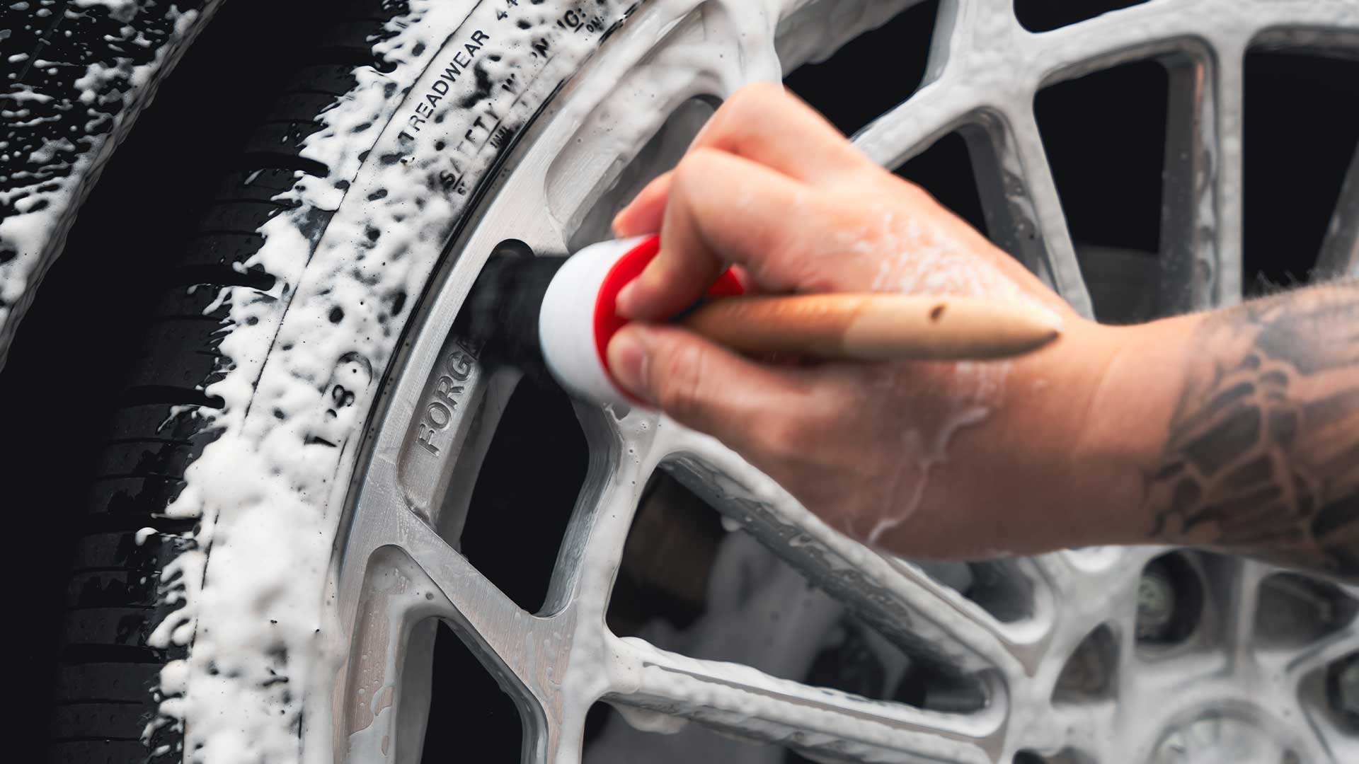 cleaning wheel and tire with brush