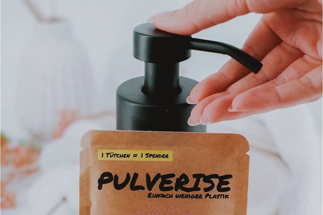 Pulverize soap powder and bottle made from recycled glass.