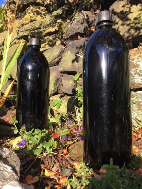 Miron bottles charging water in the sun