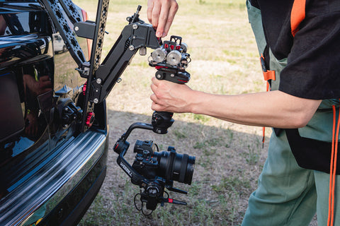 Image Showing A Gimbal Being Mounted On The Back Of Normal Car For Cinematic Shot 