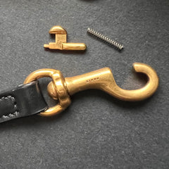 Photo of a broken strap clasp.