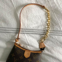 Strap extension on Louis Vuitton petite purse.
