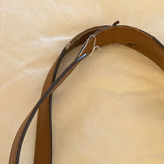 Leather straps with edge-coating peeling and cracking.
