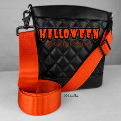 Orange strap with black hardware for handbags and purses.