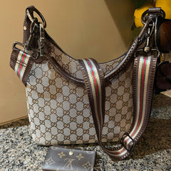 Hobo Gucci purse with accessory strap by Mautto.