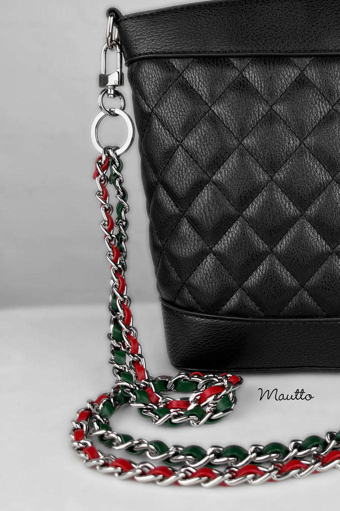 Custom chain strap with red and green leather woven strands.