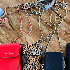 Kate Spade accessory phone cases with longer woven chain straps.