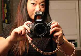 Chic pink leather + chain strap added to camera.