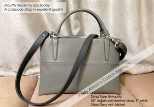 Coach handbag converted to crossbody bag with adjustable leather strap in complementary gray color.