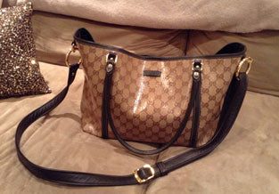 Adjustable shoulder strap added to vintage Gucci bag.