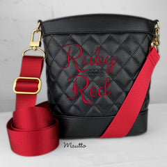 Deep red strap for statement purse.