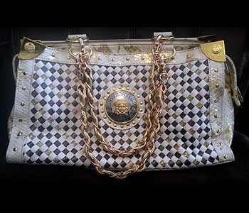 Vintage Versace handbag straps replaced.