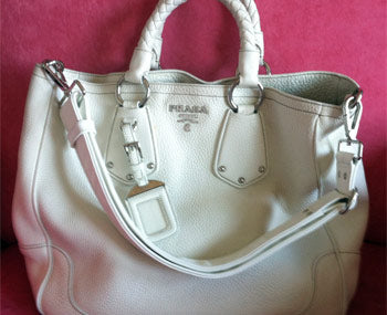 Prada bag with canvas strap converted to leather adjustable strap.