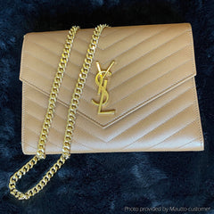 YSL clutch with accessory gold strap by Mautto.