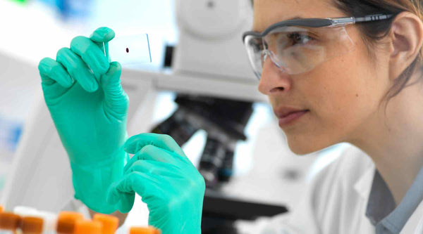 Picture of a lady testing some products