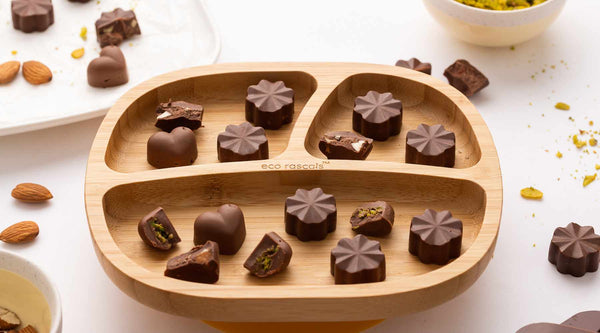 Milk chocolate with almonds and pistachio
