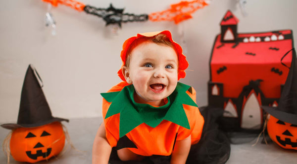 Child dressed up was a pumpkin