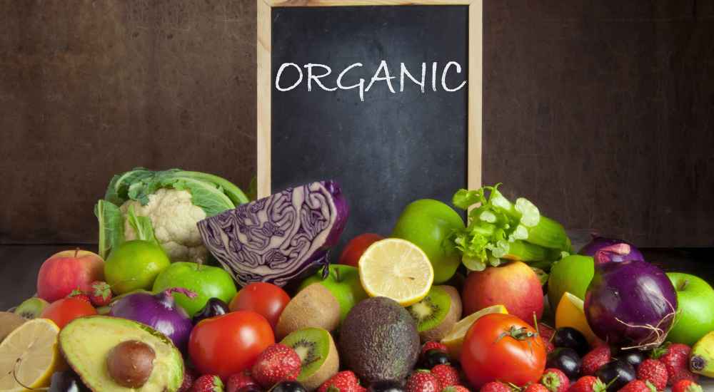 Organic food on a table with a sign