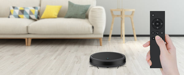 Srhythm Robotic vacuum cleaner being placed in the living room