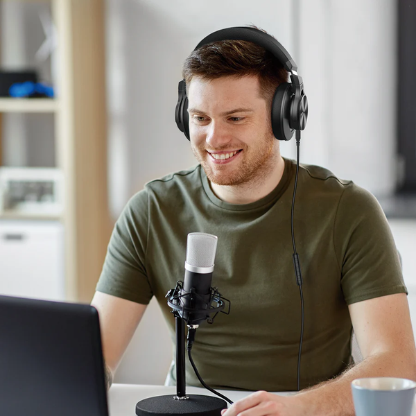 A Gentleman in the studio using HD headphones
