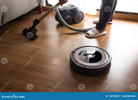 Image of Robot vacuum and traditional vacuum mopping