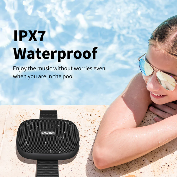 Image of a lady using Srhythm Bluetooth speaker at the pool