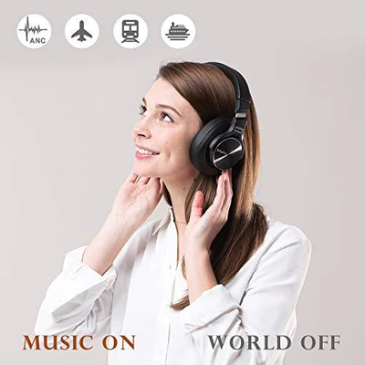 A Lady enjoying her music on Headphones which is having a long-lasting battery