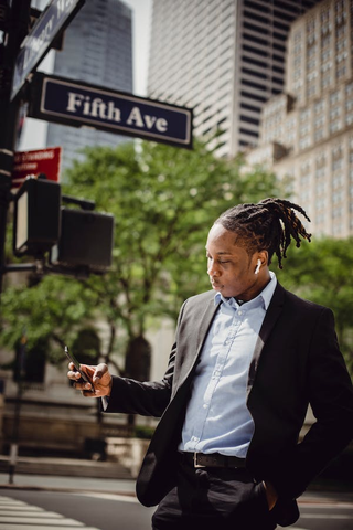 A gentleman using ANC Earbuds