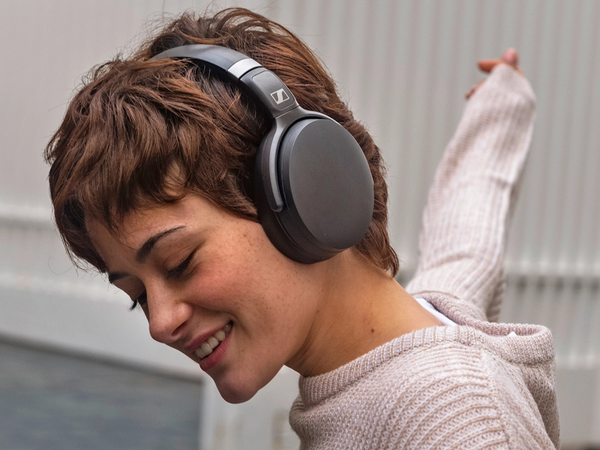 Image from Google search: A Lady using Sennheiser HD for music