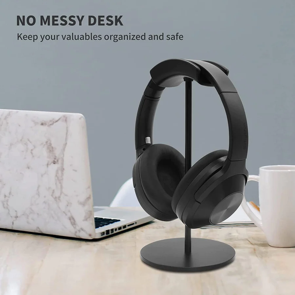 Image of Headphones being placed on the Headphone Stand