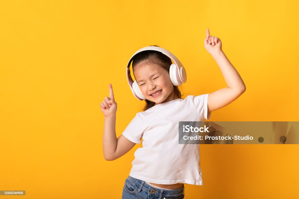 Images from istockphoto.com, Kid Using Mini kid’s Headphones for music