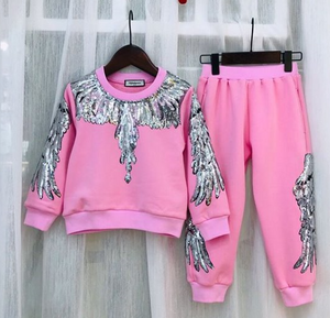 pink hoodie and sweatpants