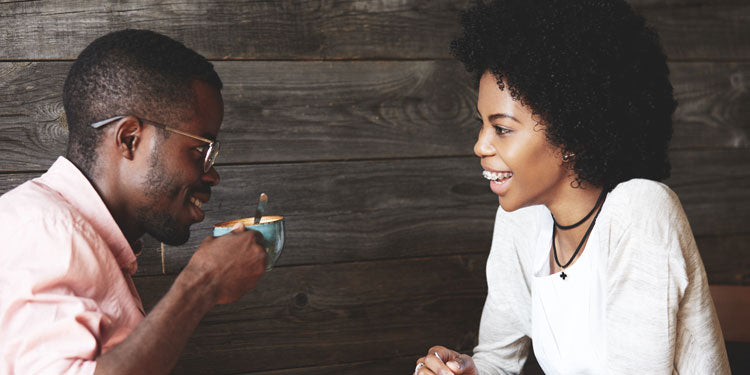 couple drinking coffee and having a pleasant conversation