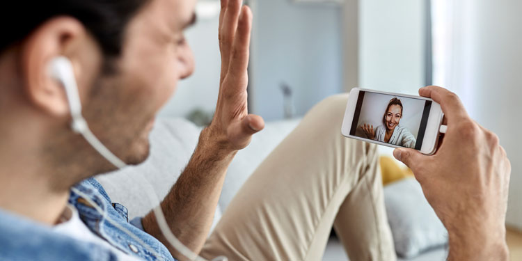 man and woman having a video call