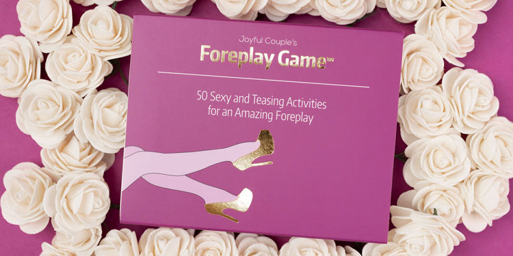 joyful couple's foreplay game surrounded by white roses
