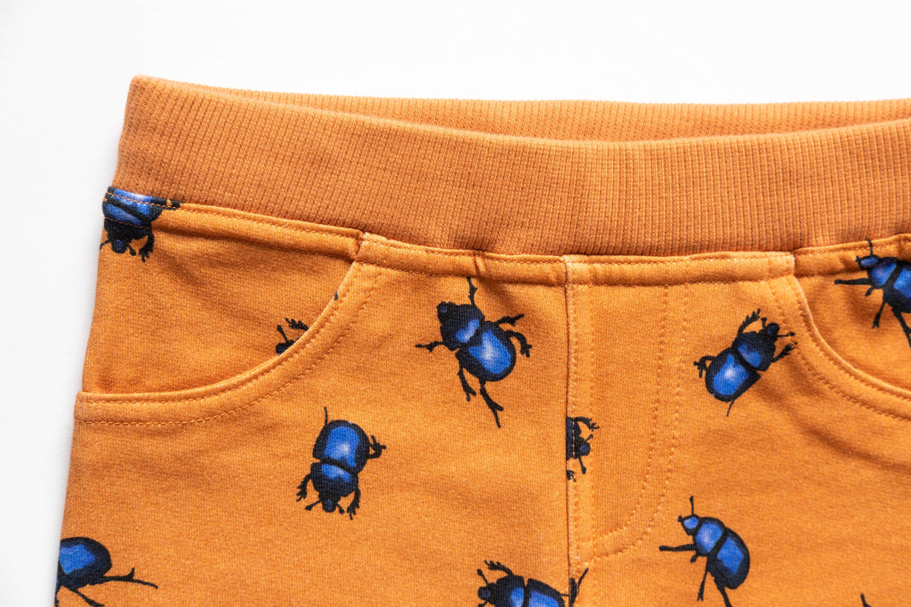 What are treggings? Treggings with beetle print, fake fly and fake pockets