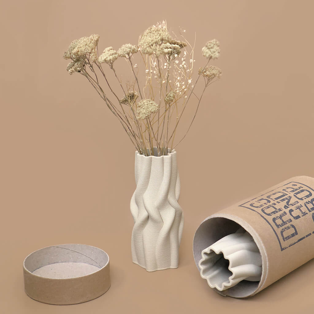 3D Printed Ceramic Vase Intertwined with 100% unbleached recyclable cardboard packaging