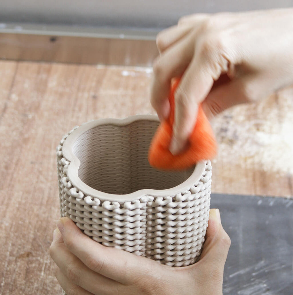 Hand finishing touches on 3D Printed Vase