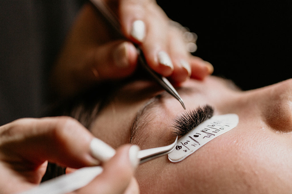 Closeup eyelash extension application