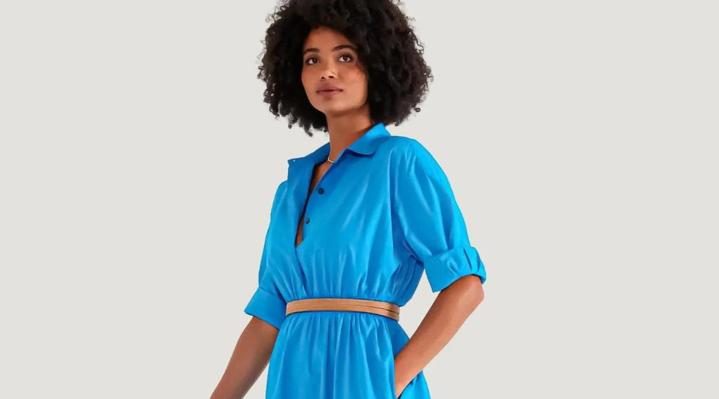 Model wearing blue Etica Denim Tina dress