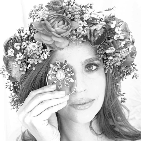 daniela villegas in black and white wearing flower crown 