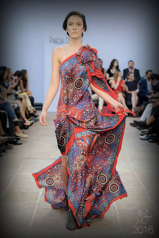 Model wearing a runway dress by Macario Jimenez