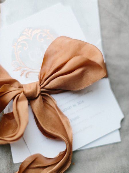 Wedding invitation with copper accents