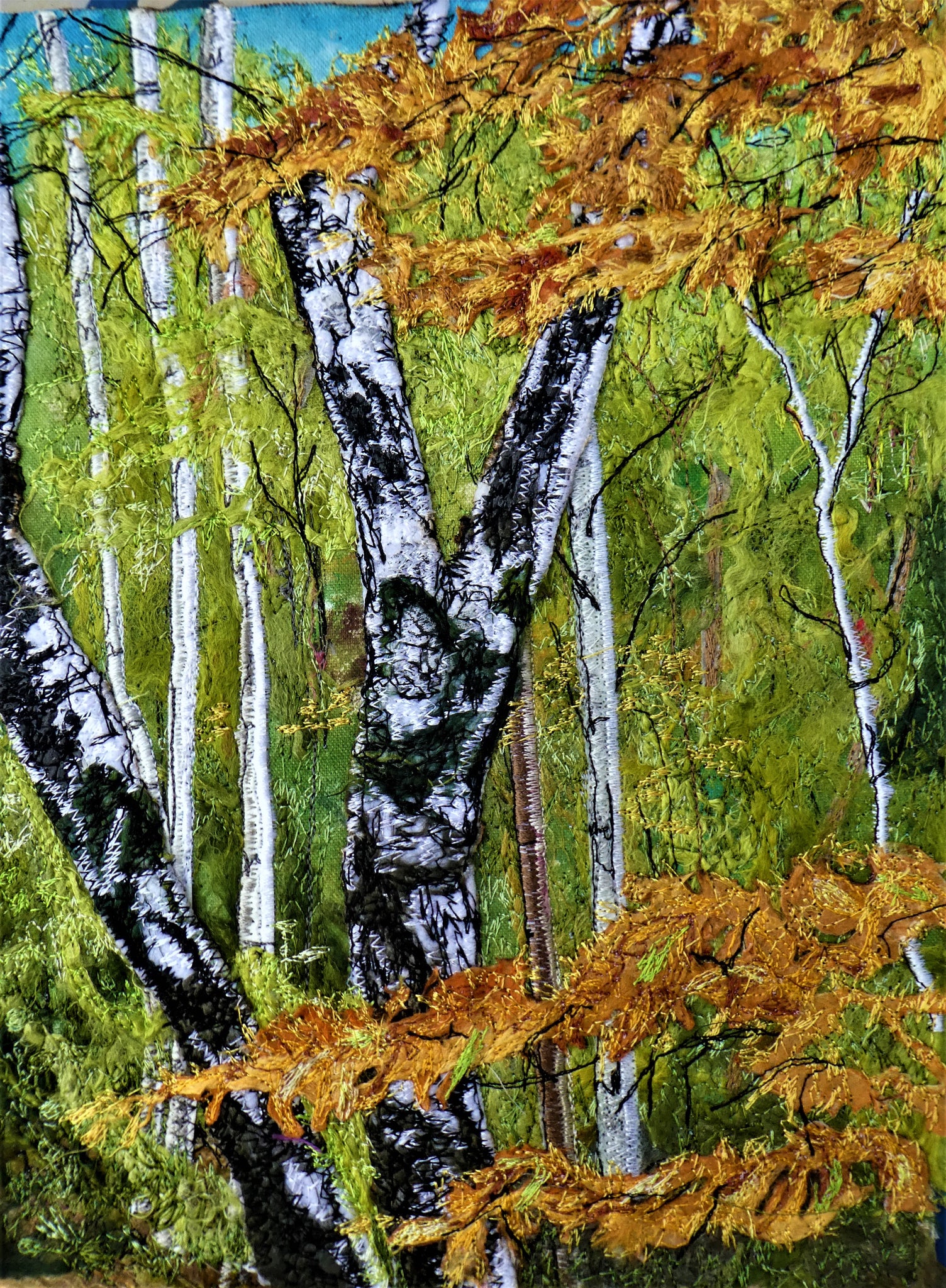 diana mckinnon textile artist, tree top view, original free-form sewn picture of trees in autumn colour