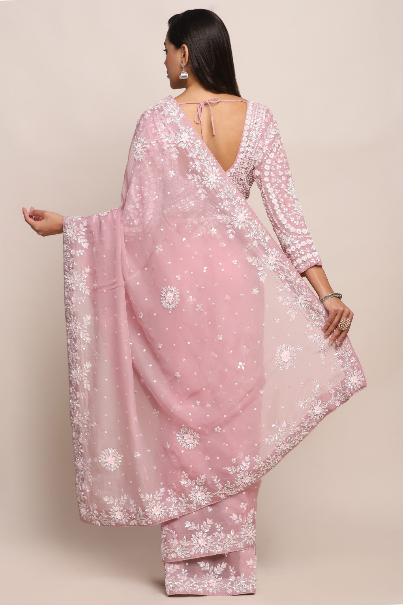 Elegant pink color floral motif embroidered saree