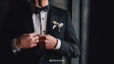 For a look that never goes out of style, consider classic black suits. Black exudes sophistication and pairs effortlessly with crisp white shirts and black ties.