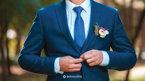 Navy suits have become a popular choice for weddings due to their versatility and timeless appeal. A navy suit can be accessorized with various tie and pocket square options.