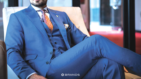 If your wedding has a specific theme, embrace it by incorporating thematic elements into the groomsmen's suits.